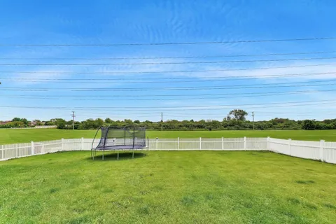 a house view with a outdoor space