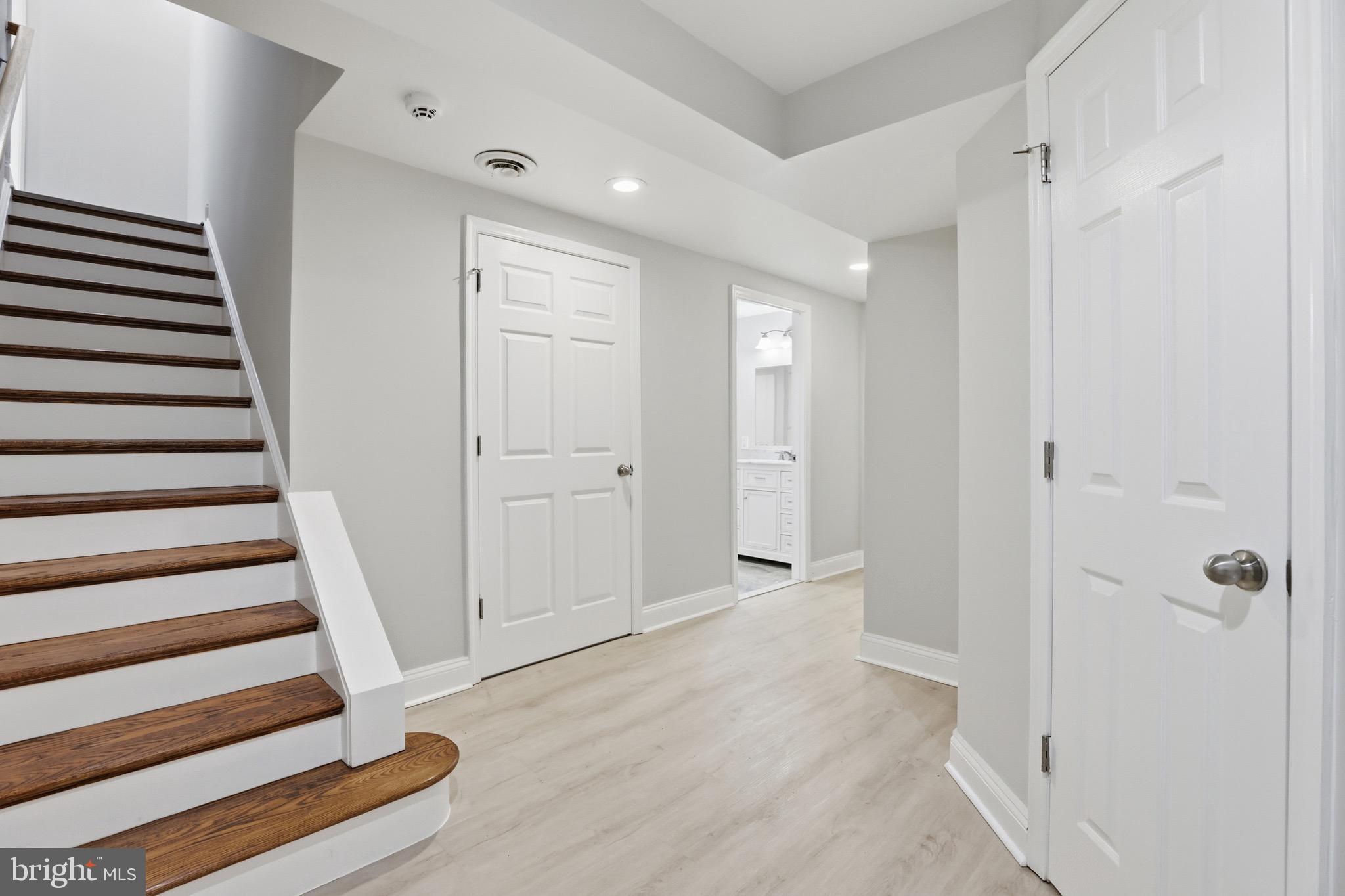26410 Haines Road Clarksburg, MD 20871 - Photo 24 of 33 wooden floor in a hall with an entryway