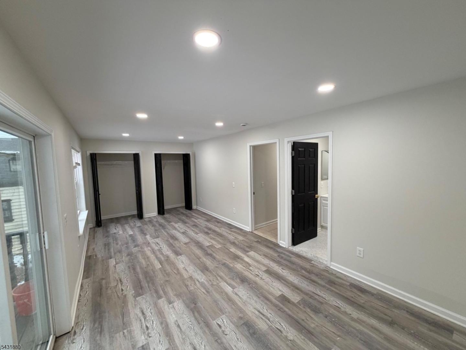 167 North 5th Street, Unit 2 Paterson, NJ 07522 - Photo 8 of 8 a view of hallway with wooden floor