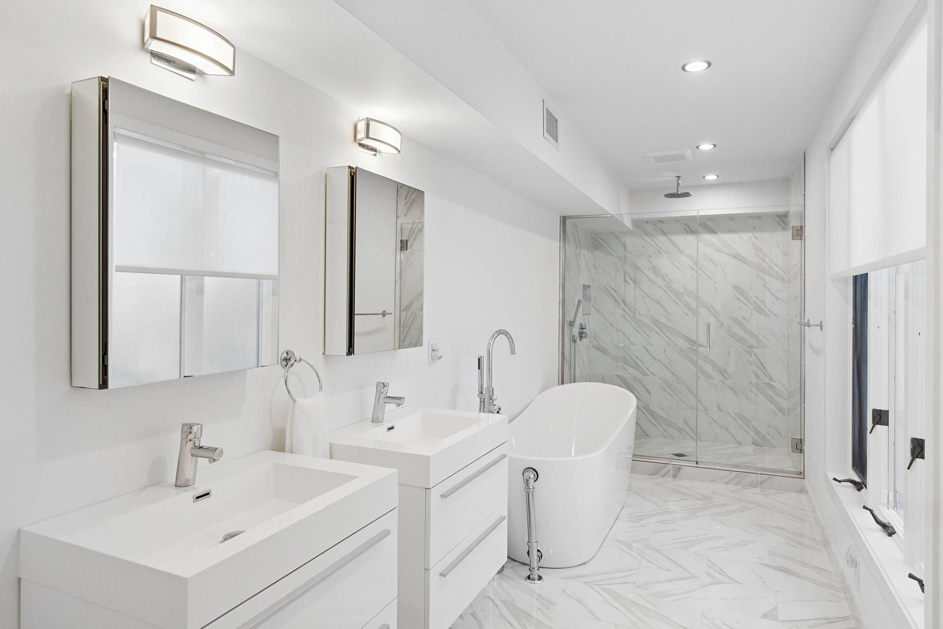 4 Bayberry Lane Remsenburg, NY 11960 - Photo 12 of 29 a bathroom with a double vanity sink mirror and toilet
