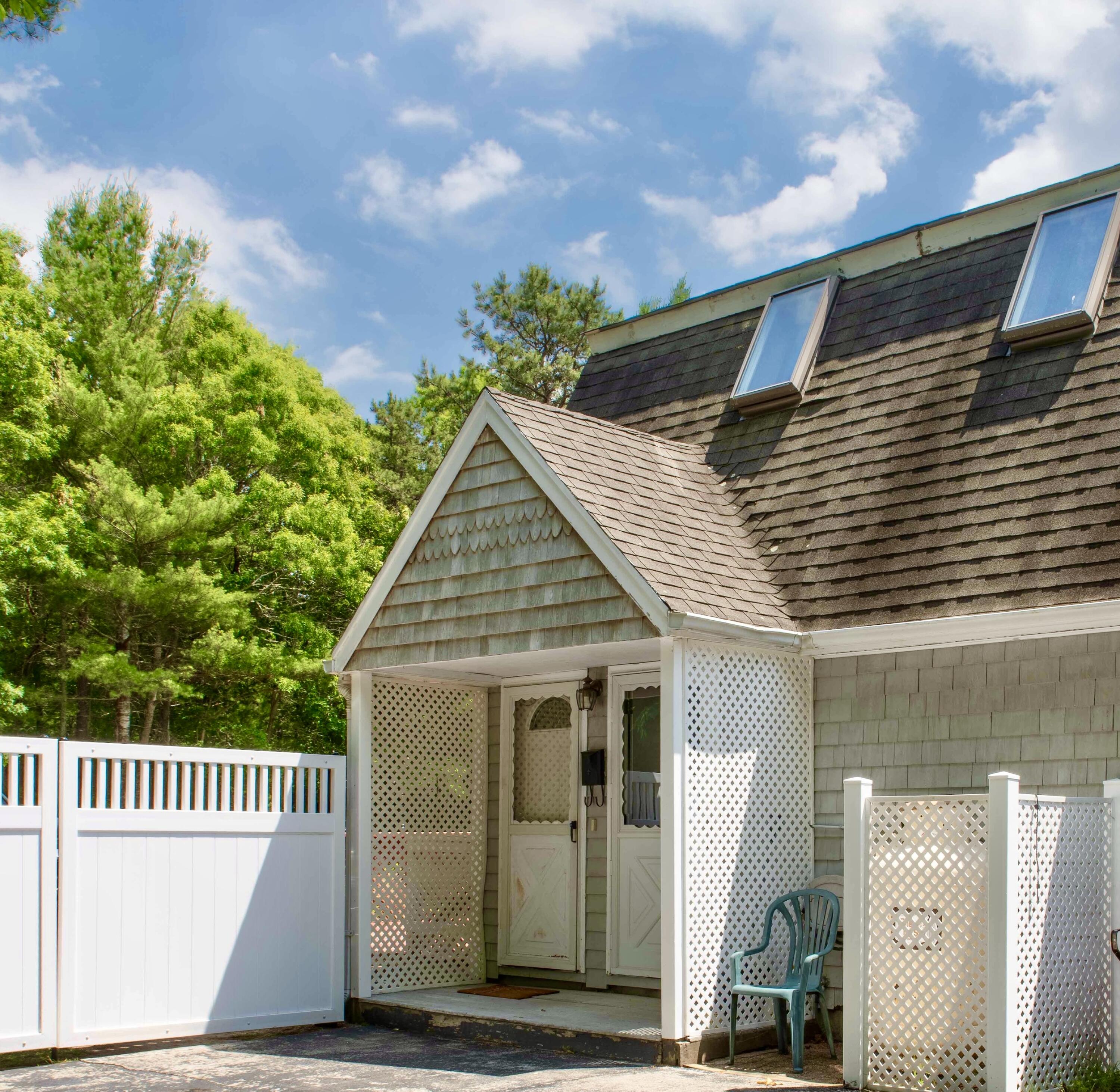 501 County Road Pocasset, MA 02559 - Photo 25 of 33 a view of a house with a small yard and wooden fence