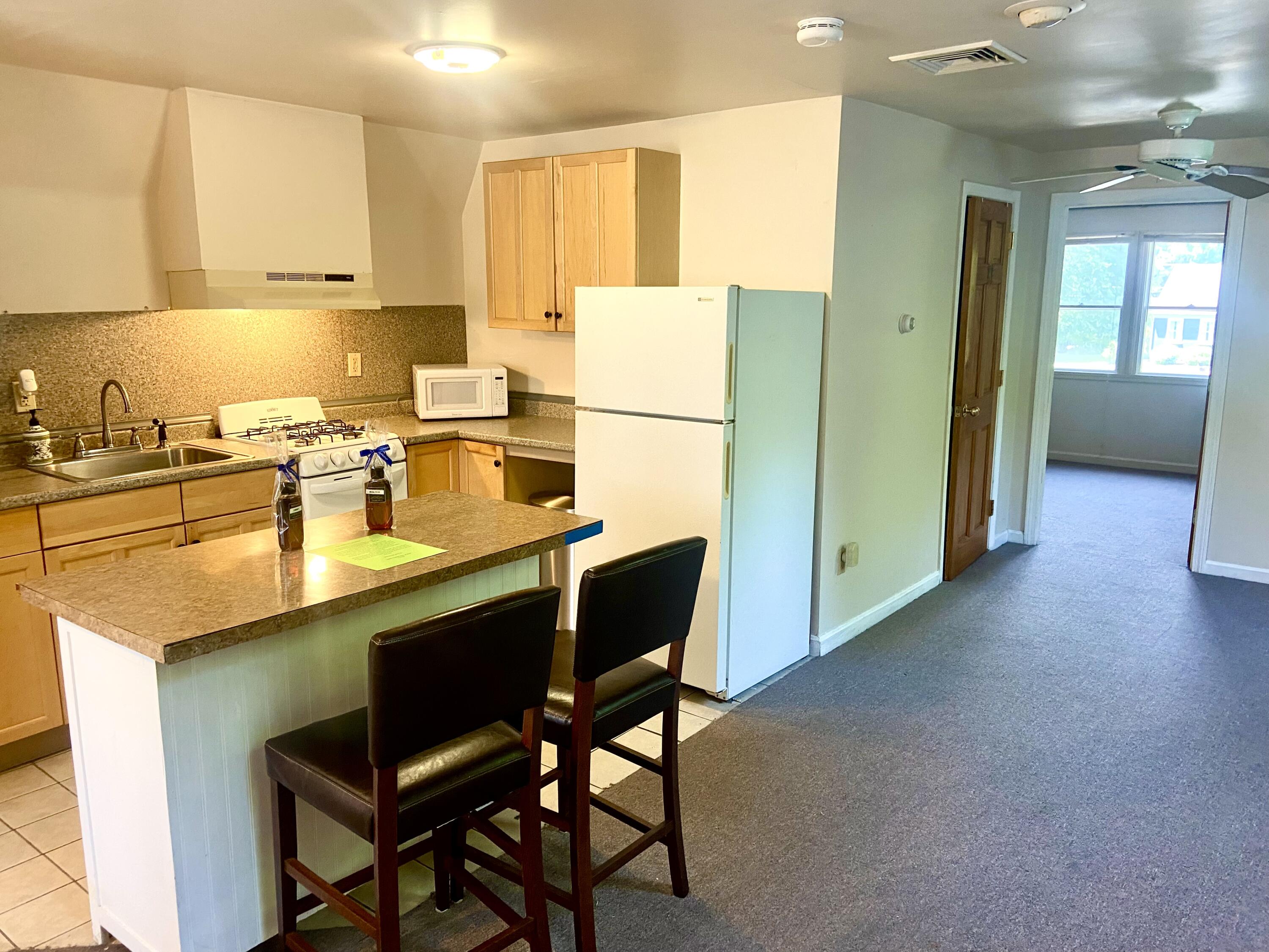 501 County Road Pocasset, MA 02559 - Photo 26 of 33 a kitchen with a sink cabinets and window