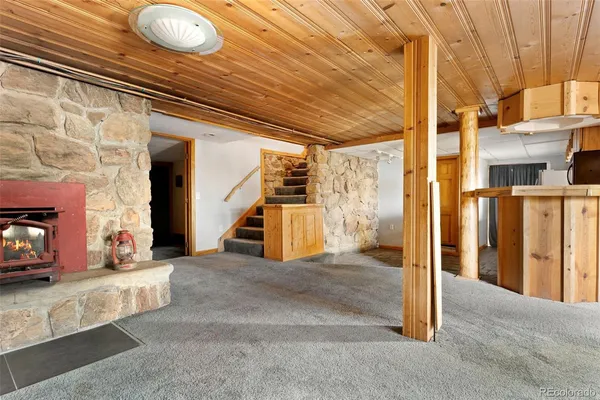 a view of a fireplace and window