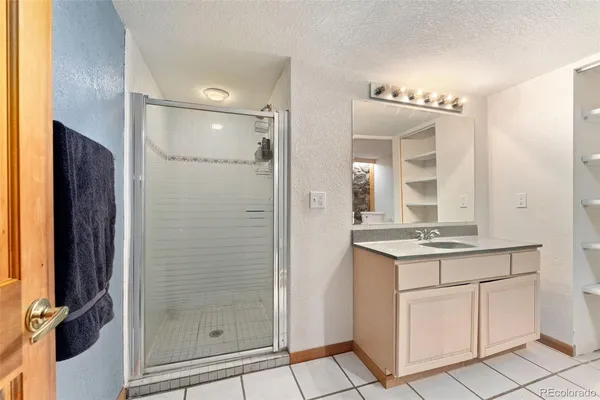 a view of a balcony with wooden floor