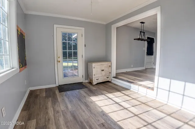 a view of an empty room and window