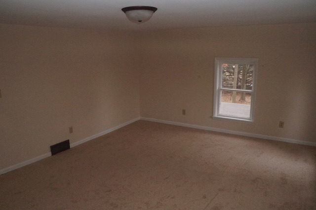 1838 Old State Road Esmond, IL 60129 - Photo 17 of 21 an empty room with a window