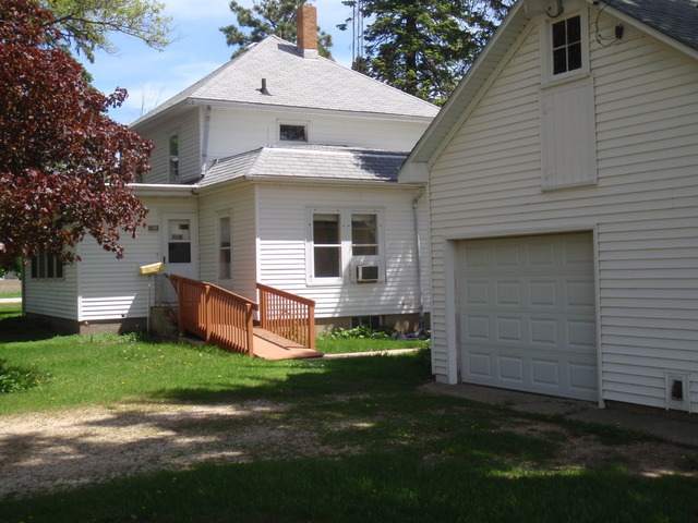 1838 Old State Road Esmond, IL 60129 - Photo 2 of 21 a front view of a house with a yard and garage