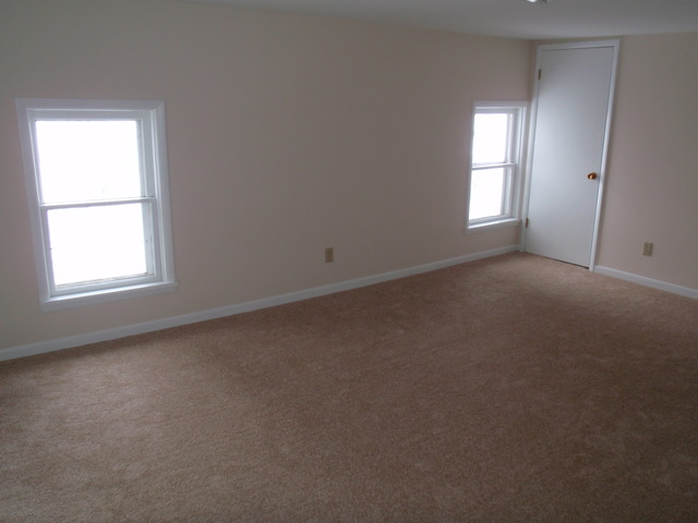 1838 Old State Road Esmond, IL 60129 - Photo 7 of 21 an empty room that has a window