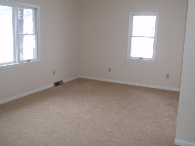 1838 Old State Road Esmond, IL 60129 - Photo 9 of 21 an empty room with a window