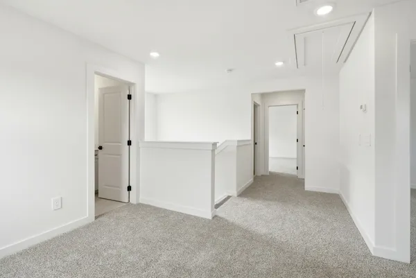 an empty room with a bathroom