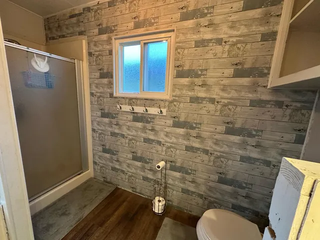 a bathroom with a bathtub sink and toilet
