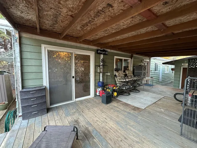 a backyard of a house with seating space