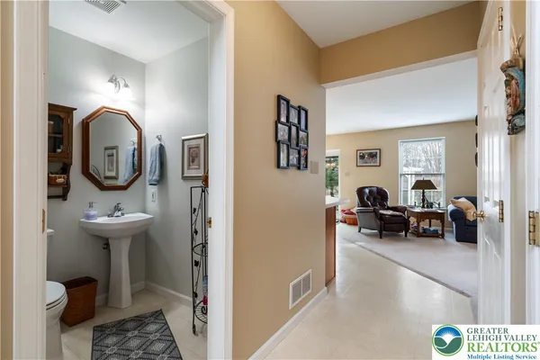 a kitchen with stainless steel appliances granite countertop a stove and a refrigerator