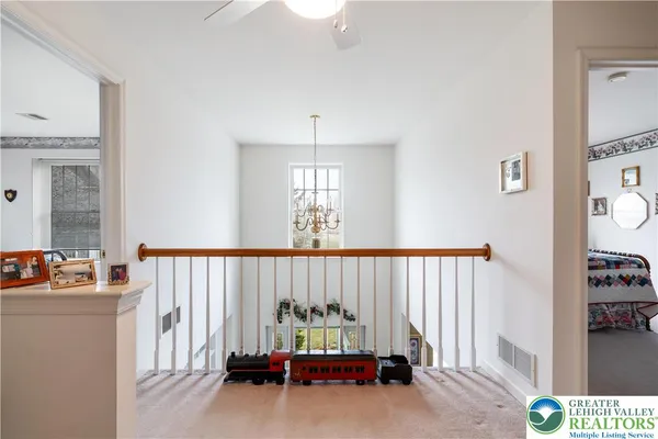 a view of a livingroom with a staircase
