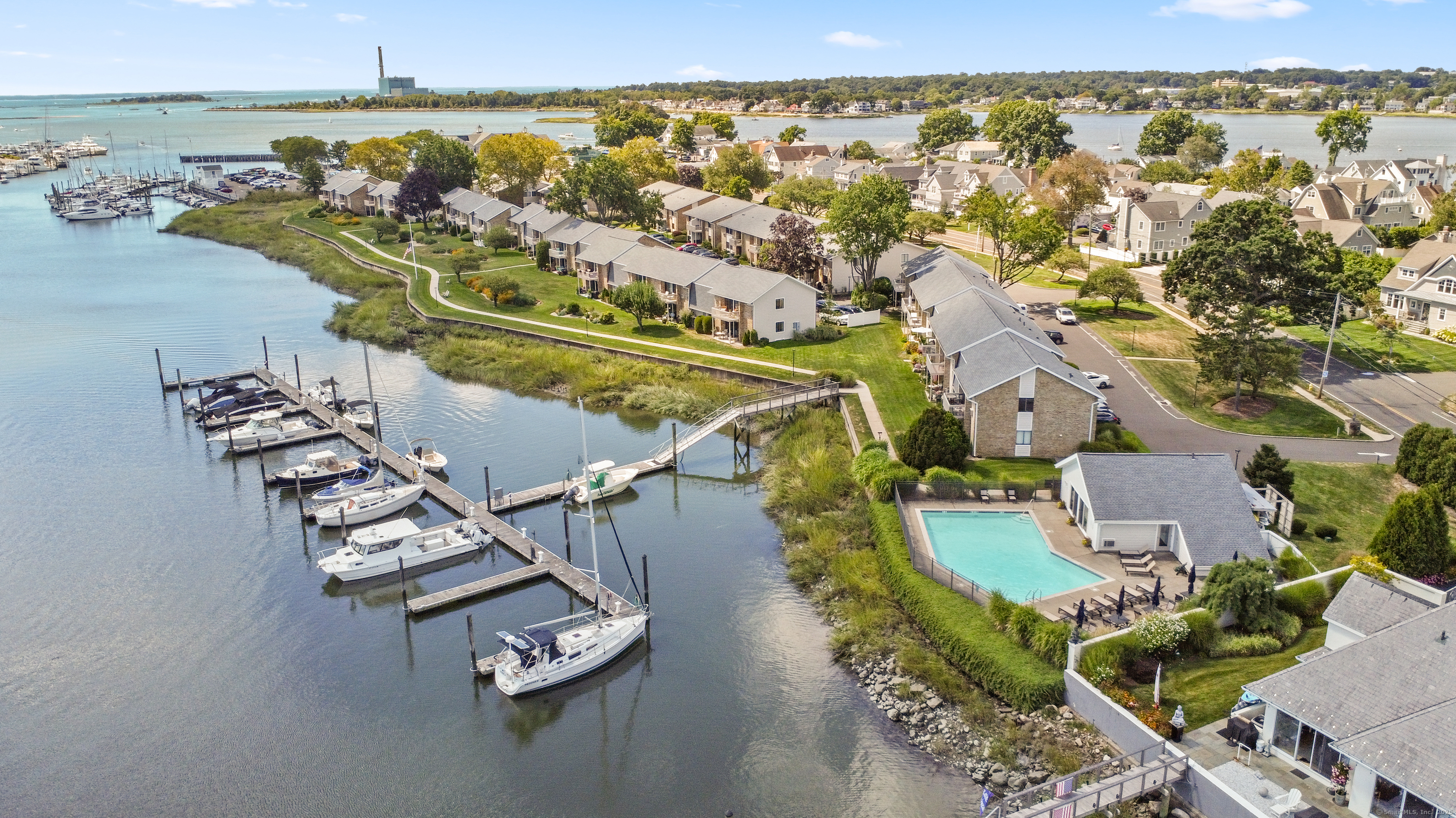 199 Gregory Boulevard, Unit D2 Norwalk, CT 06855 - Photo 1 of 31 an aerial view of a city with ocean view