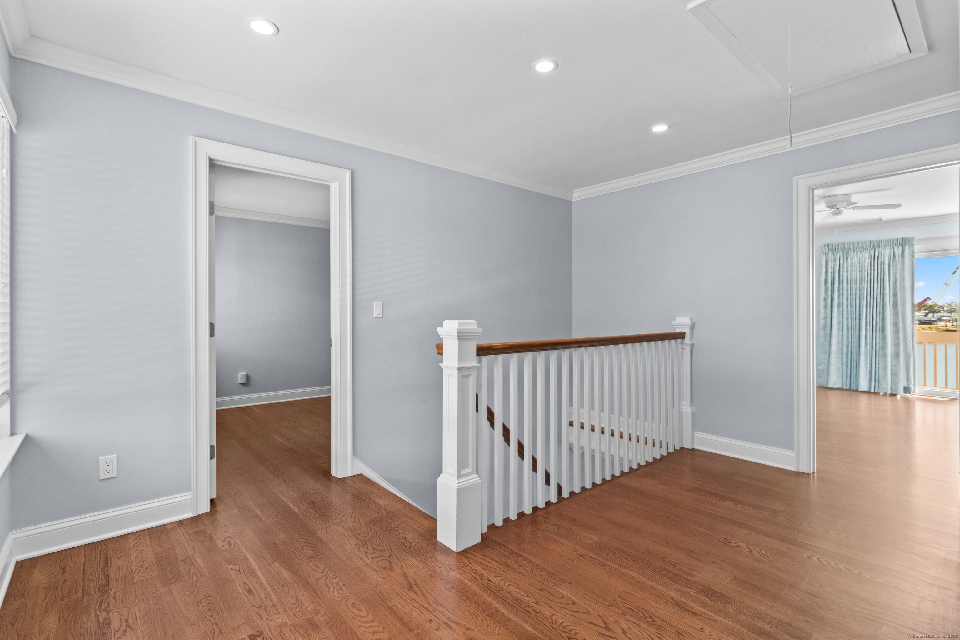 199 Gregory Boulevard, Unit D2 Norwalk, CT 06855 - Photo 12 of 31 a view of a hallway with wooden floor