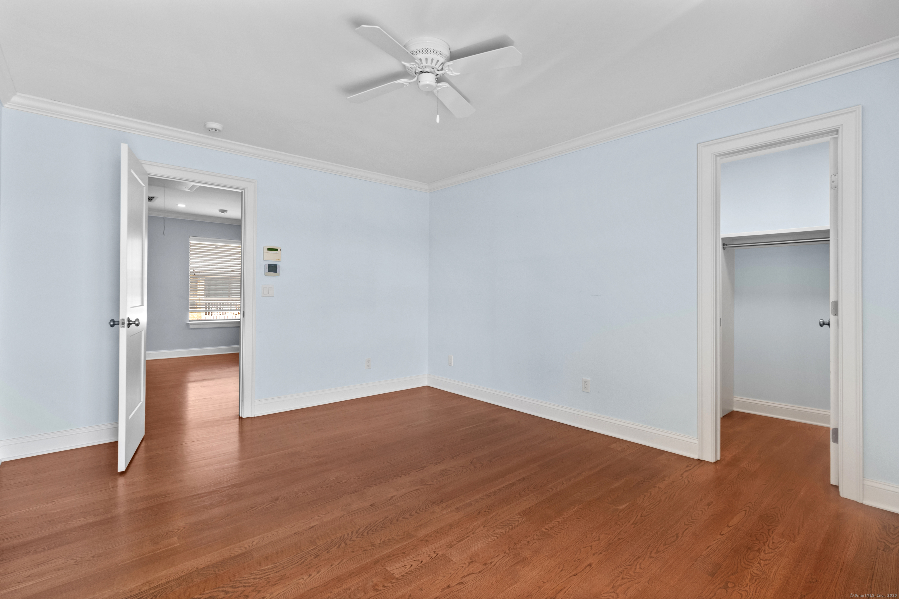 199 Gregory Boulevard, Unit D2 Norwalk, CT 06855 - Photo 15 of 31 a view of an empty room with wooden floor