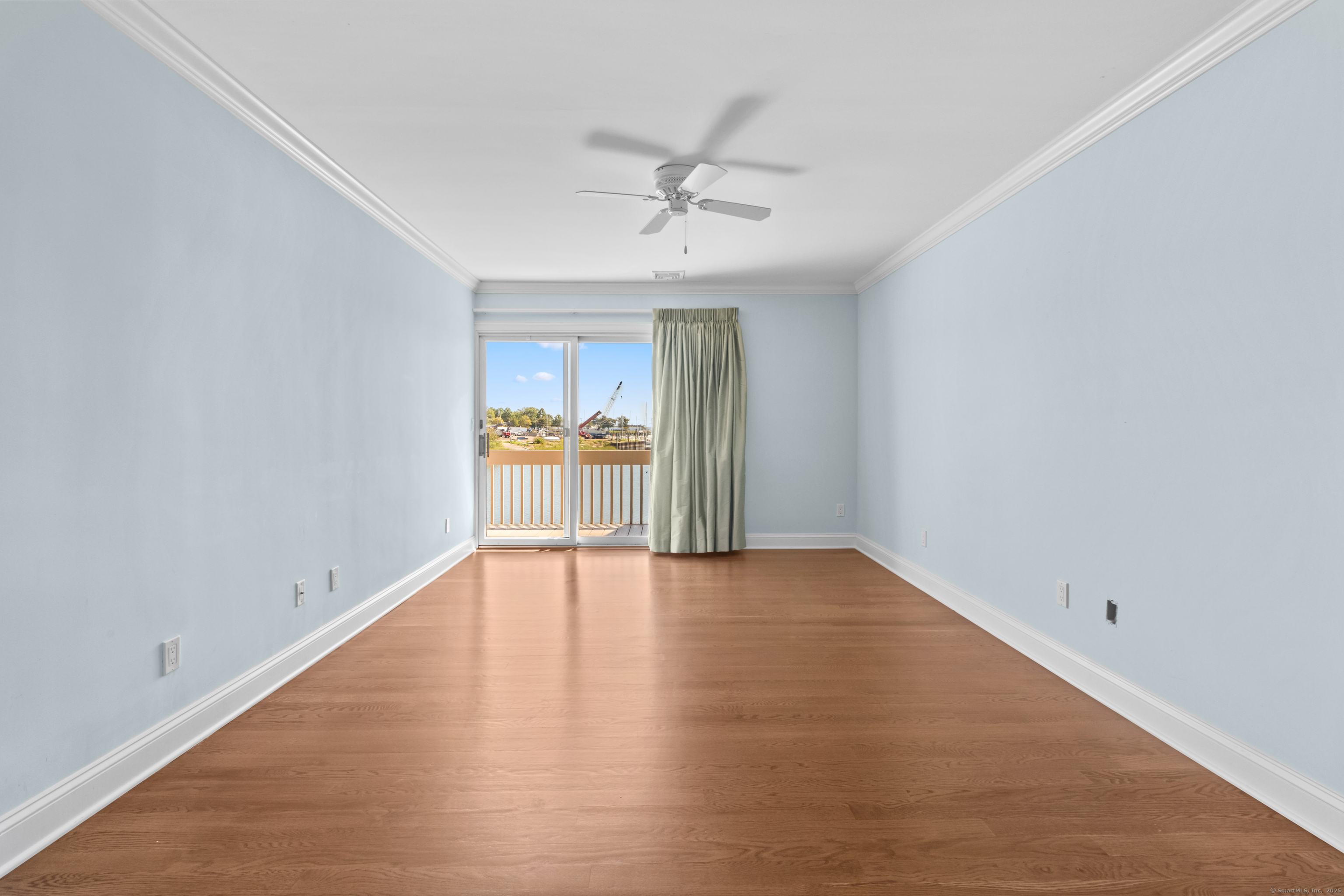 199 Gregory Boulevard, Unit D2 Norwalk, CT 06855 - Photo 18 of 31 wooden floor in an empty room with a window
