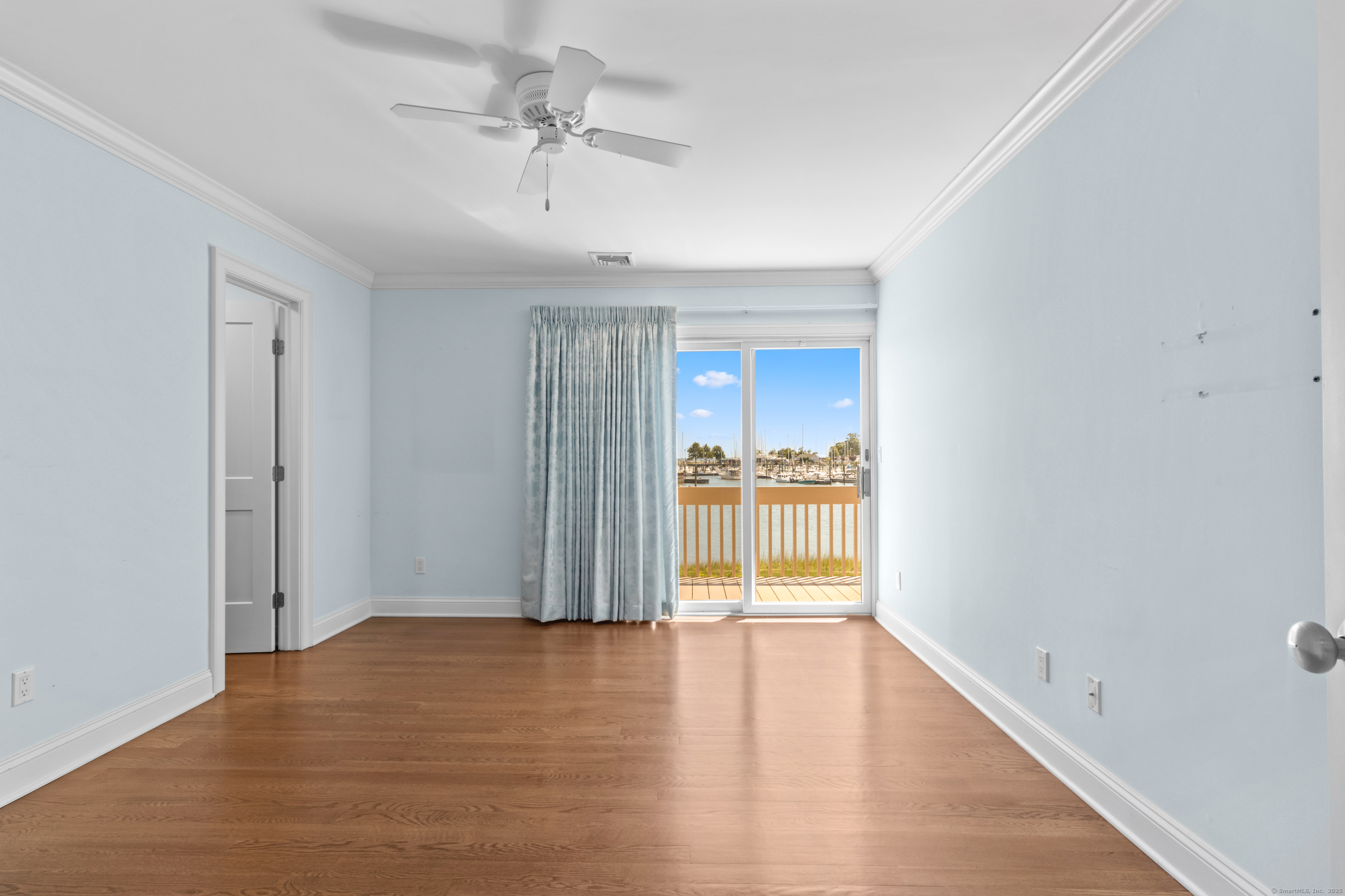 199 Gregory Boulevard, Unit D2 Norwalk, CT 06855 - Photo 19 of 31 a view of empty room with wooden floor