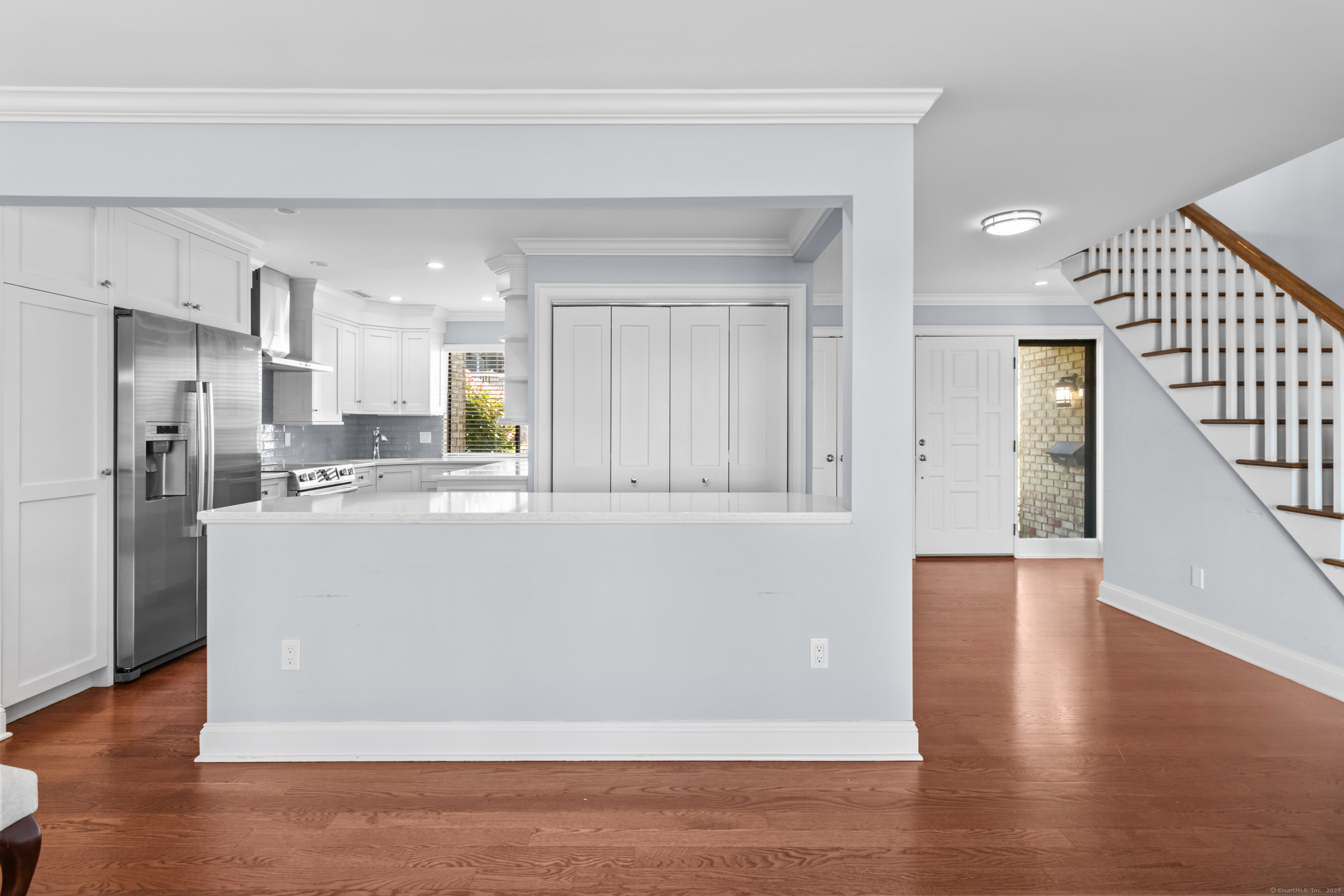199 Gregory Boulevard, Unit D2 Norwalk, CT 06855 - Photo 8 of 31 a view of kitchen with wooden floor and electronic appliances