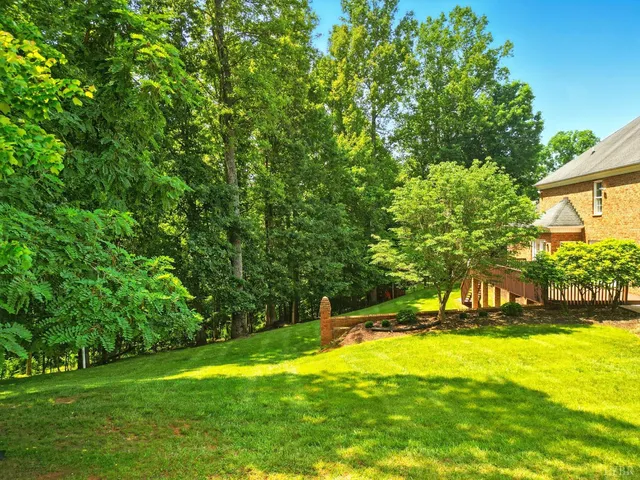 a view of swimming pool from a yard