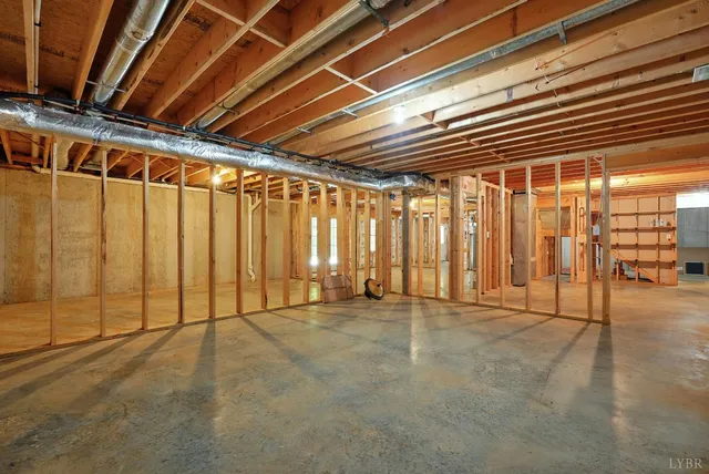 a view of a room with wooden walls