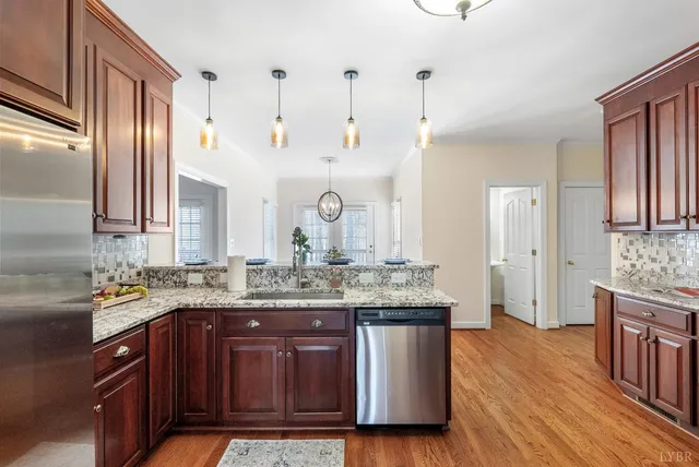 a spacious bathroom with a shower sink and mirror