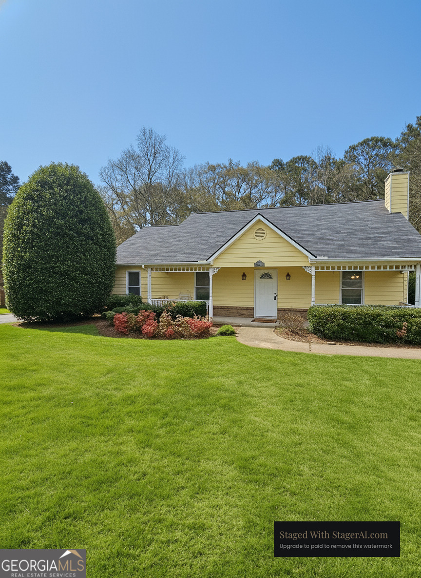a front view of a house with a yard