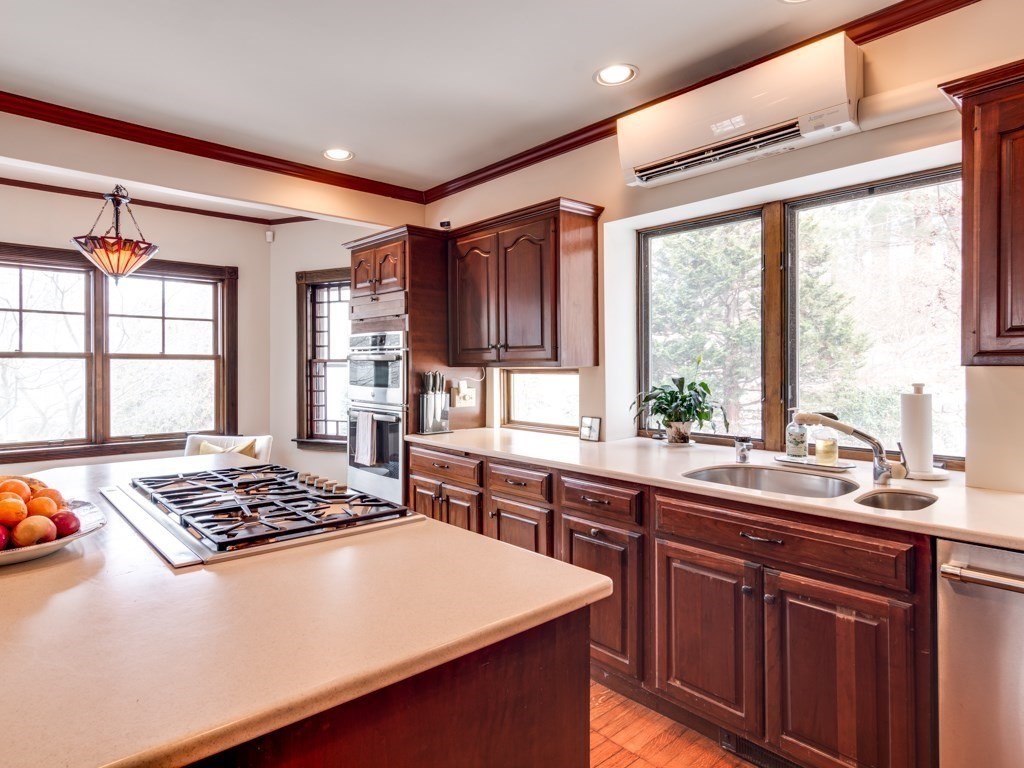 7 Emily Lane Gloucester, MA 01930 - Photo 15 of 41 a kitchen with stainless steel appliances a sink stove and window