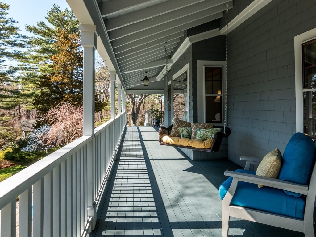7 Emily Lane Gloucester, MA 01930 - Photo 2 of 41 a view of balcony with chairs and wooden fence