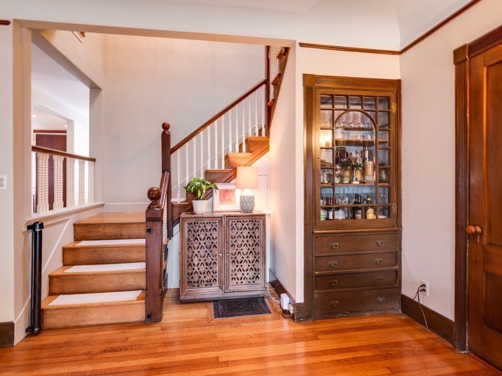 7 Emily Lane Gloucester, MA 01930 - Photo 24 of 41 a view of entryway with wooden floor and stairs