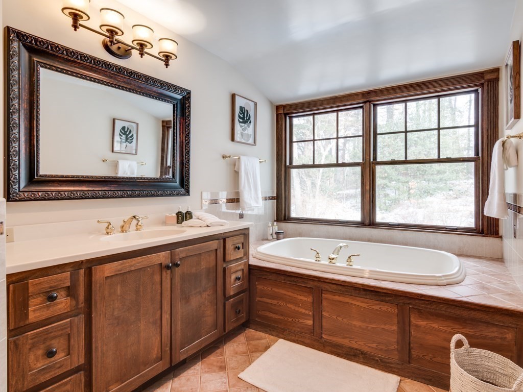 7 Emily Lane Gloucester, MA 01930 - Photo 30 of 41 a bathroom with a tub sink and mirror