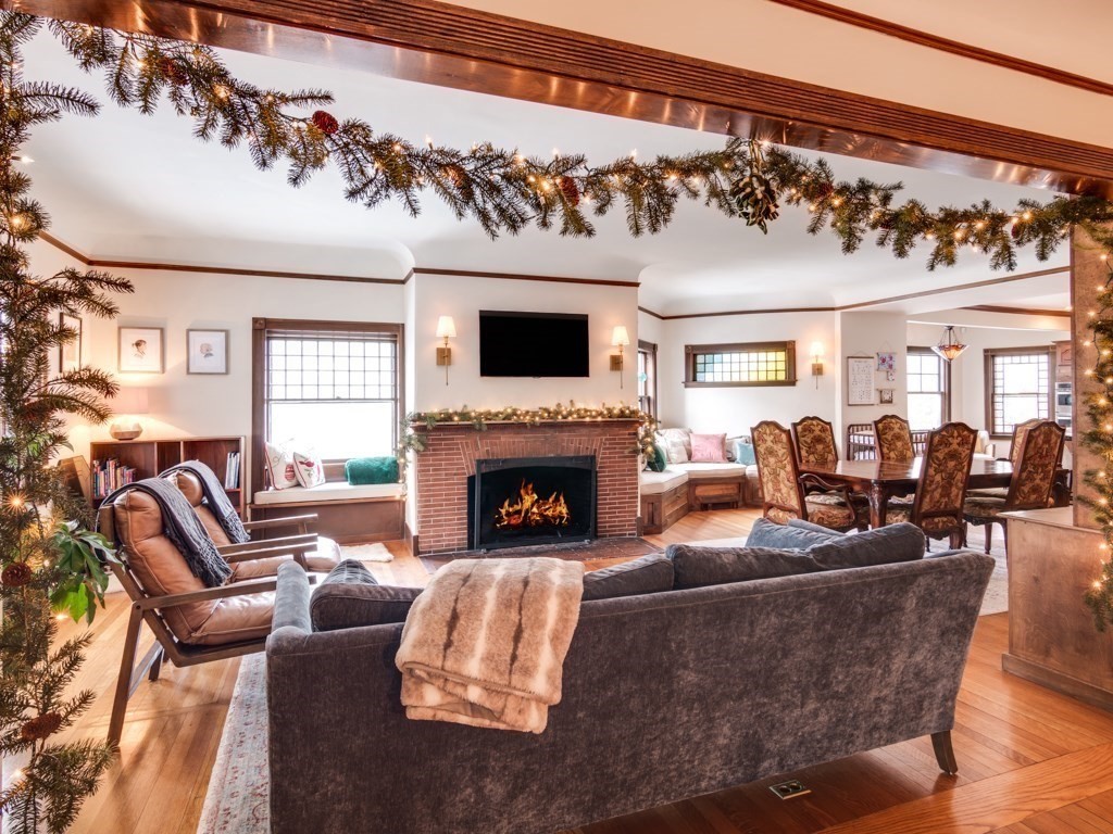 7 Emily Lane Gloucester, MA 01930 - Photo 6 of 41 a living room with furniture a fireplace and a flat screen tv