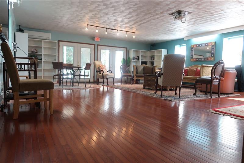 341 Story Road Export, PA 15632 - Photo 3 of 25 Huge Great-room and Powder room from Addition is full of light and opens to private back deck and yard