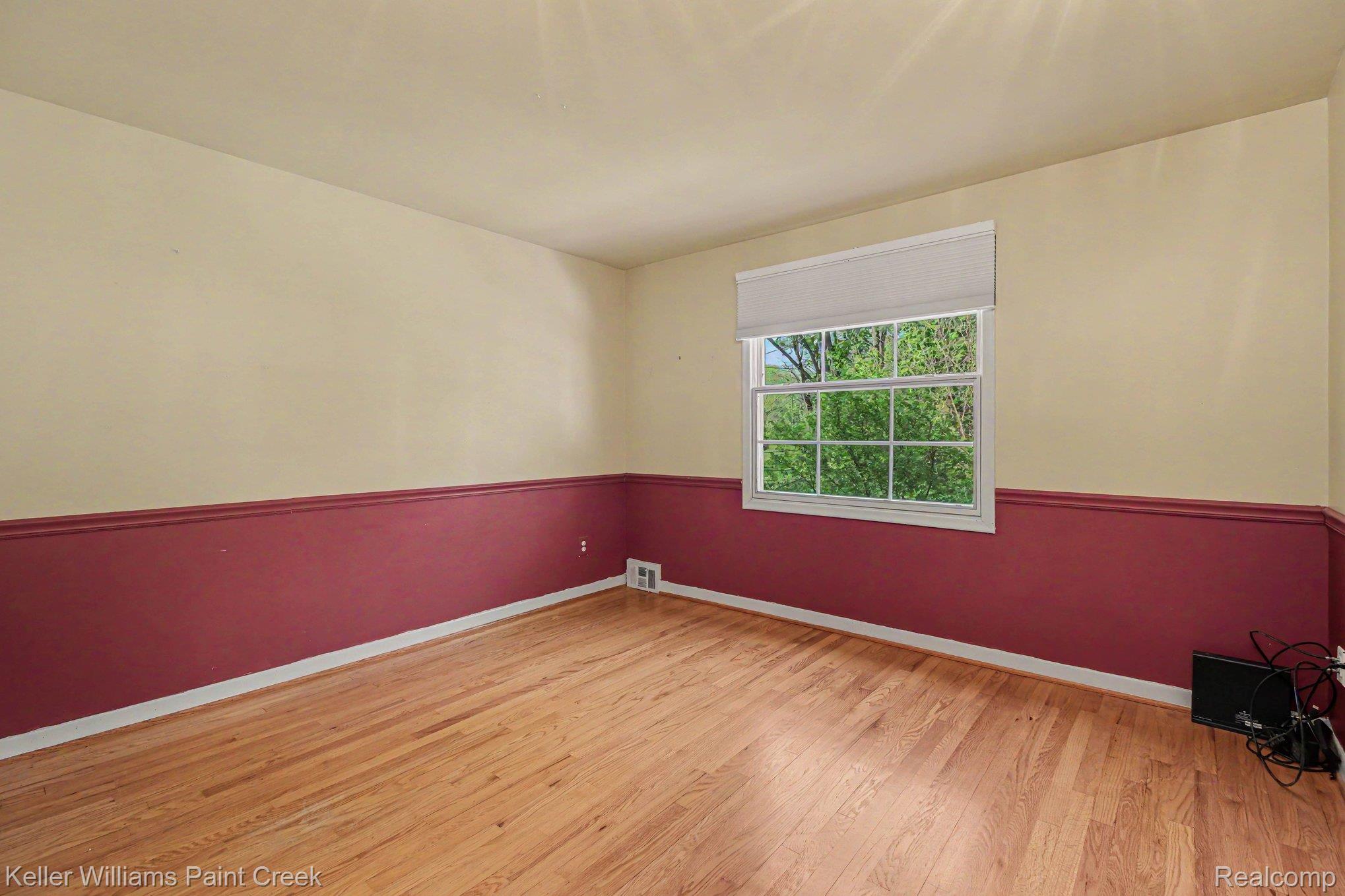 914 Croydon Road Rochester, MI 48309 - Photo 13 of 24 Three additional bedrooms occupy the opposite wing.