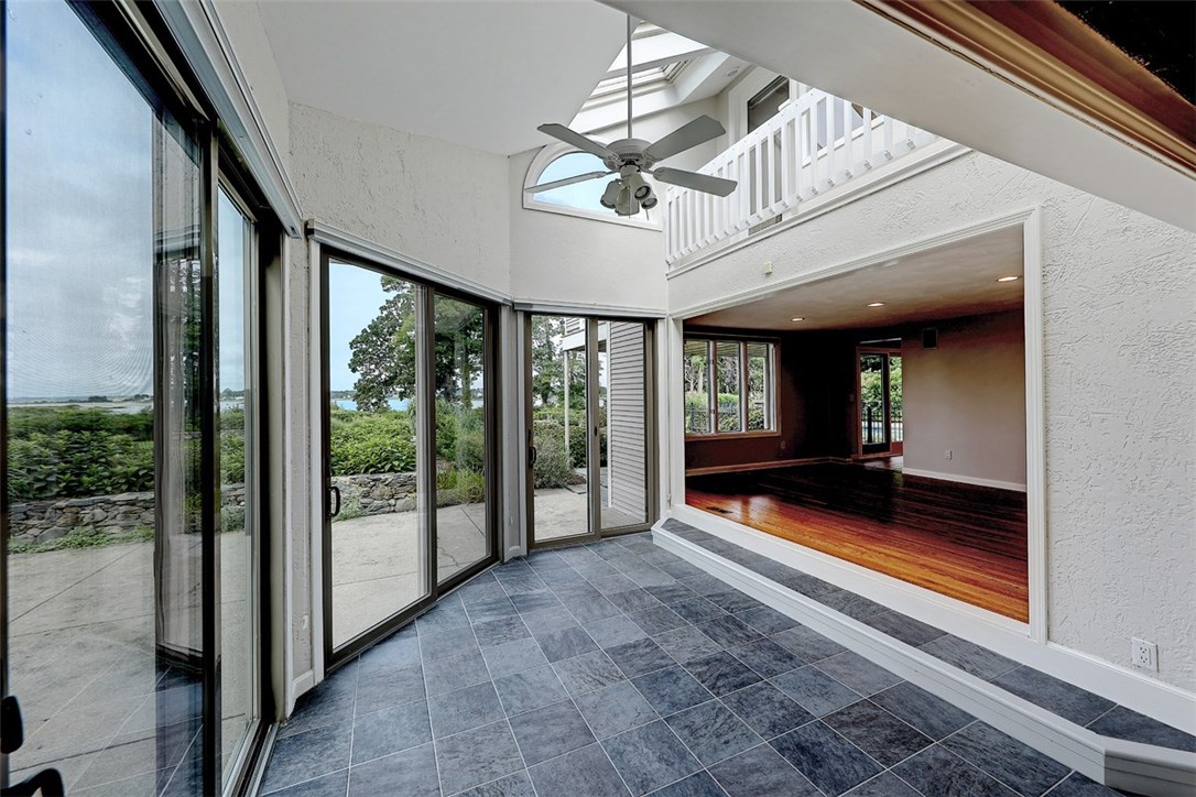 16 Oyster Point Warren, RI 02885 - Photo 14 of 38 Delightful sunroom