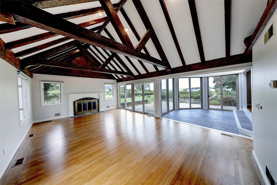 16 Oyster Point Warren, RI 02885 - Photo 15 of 38 Dramatic family room with original beams from carriage house, access to terrace