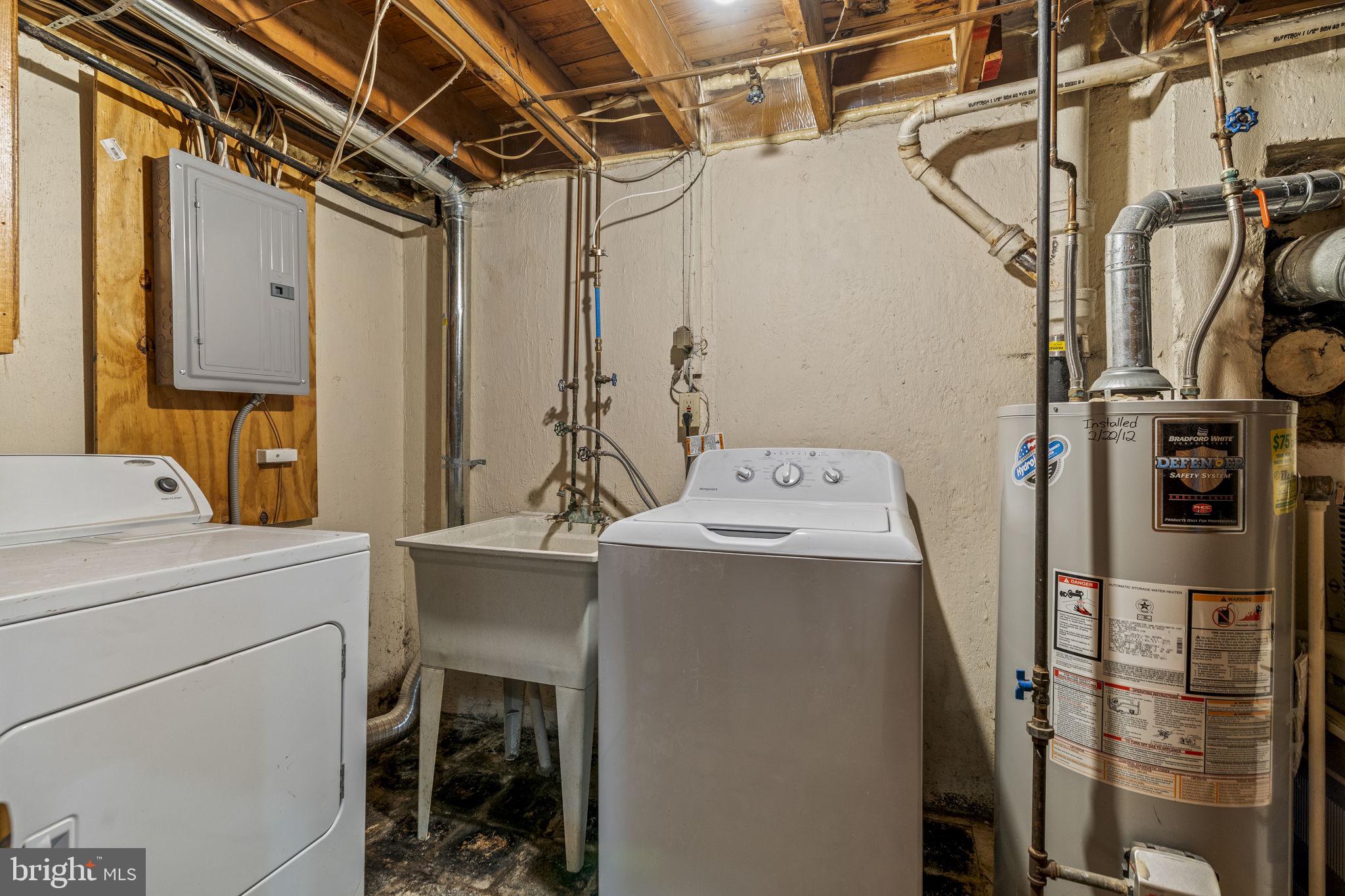326 East Rambo Street Bridgeport, PA 19405 - Photo 11 of 23 a utility room with dryer and washer