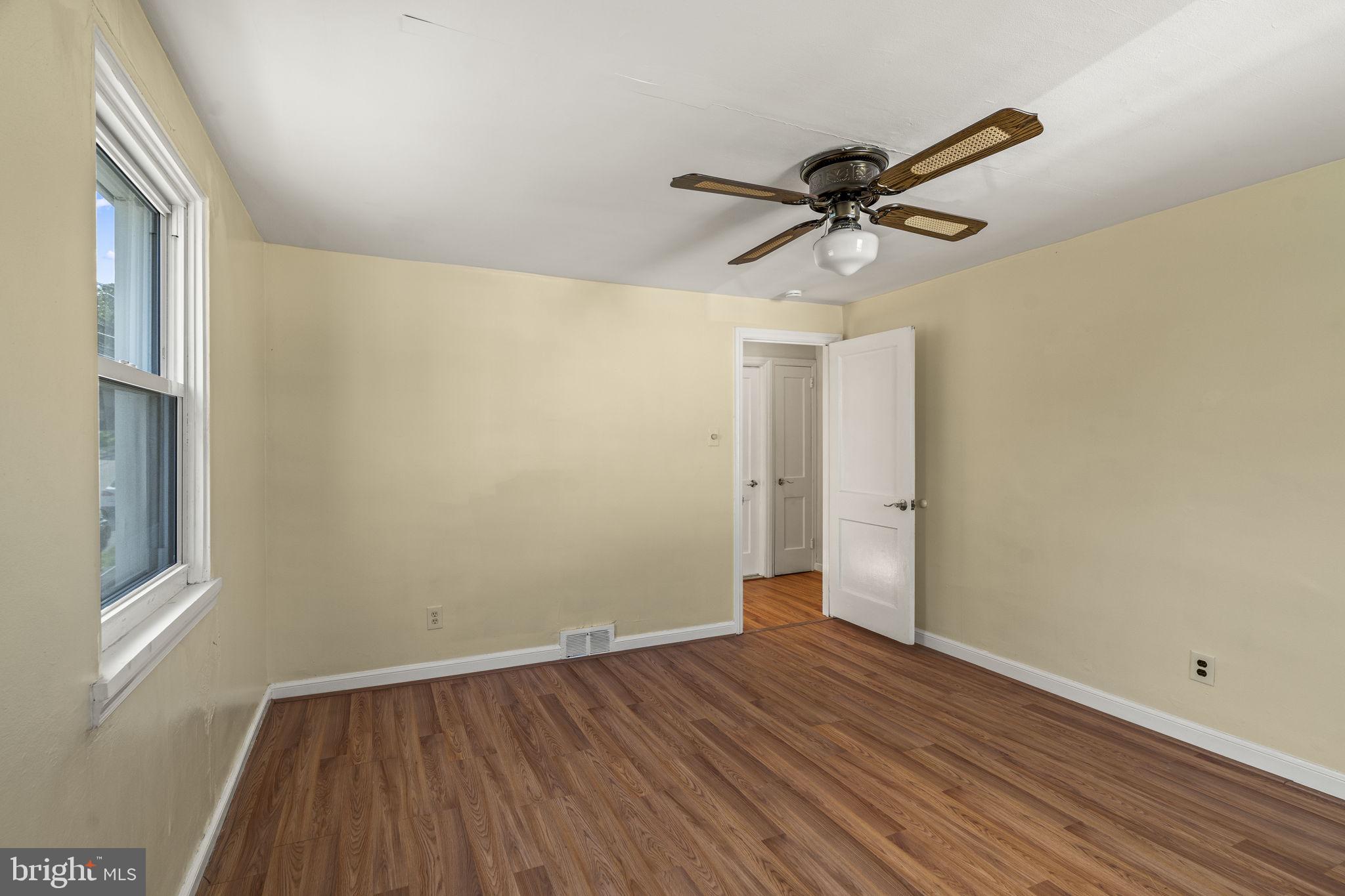 326 East Rambo Street Bridgeport, PA 19405 - Photo 16 of 23 a view of a big room with wooden floor and windows
