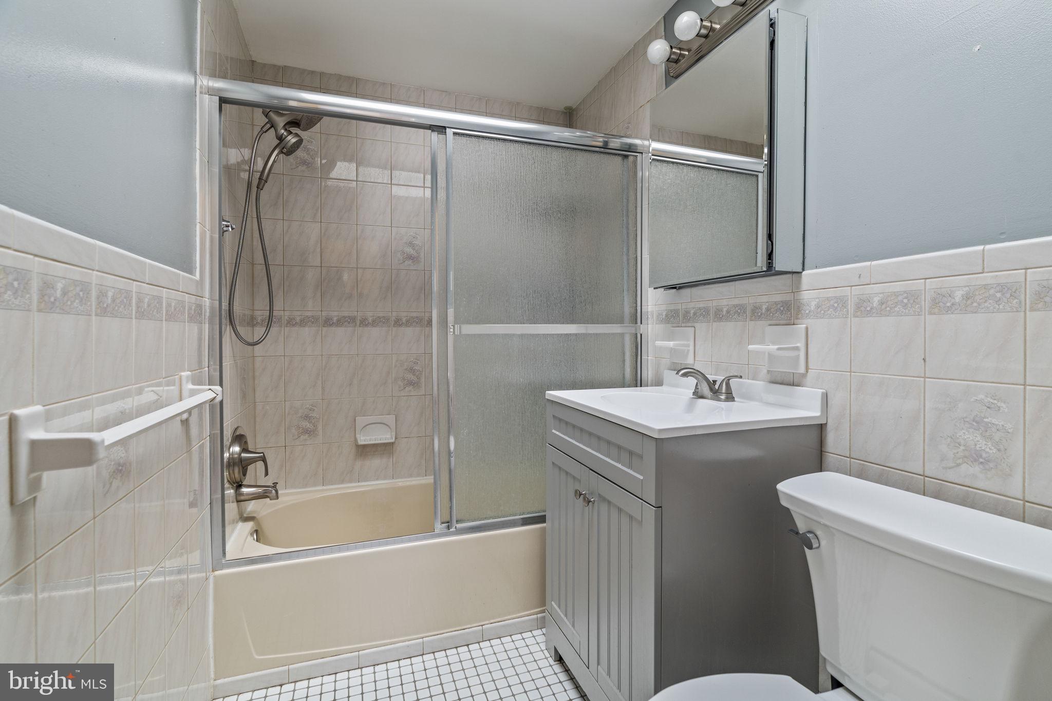326 East Rambo Street Bridgeport, PA 19405 - Photo 17 of 23 a bathroom with a sink toilet and shower