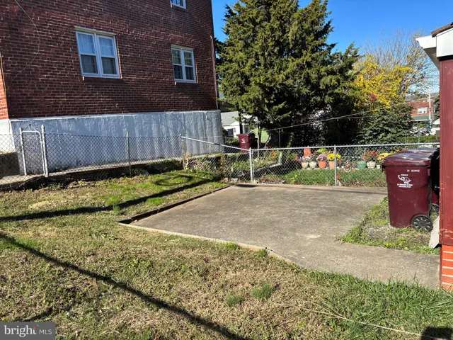 a view of a cafe with sitting area