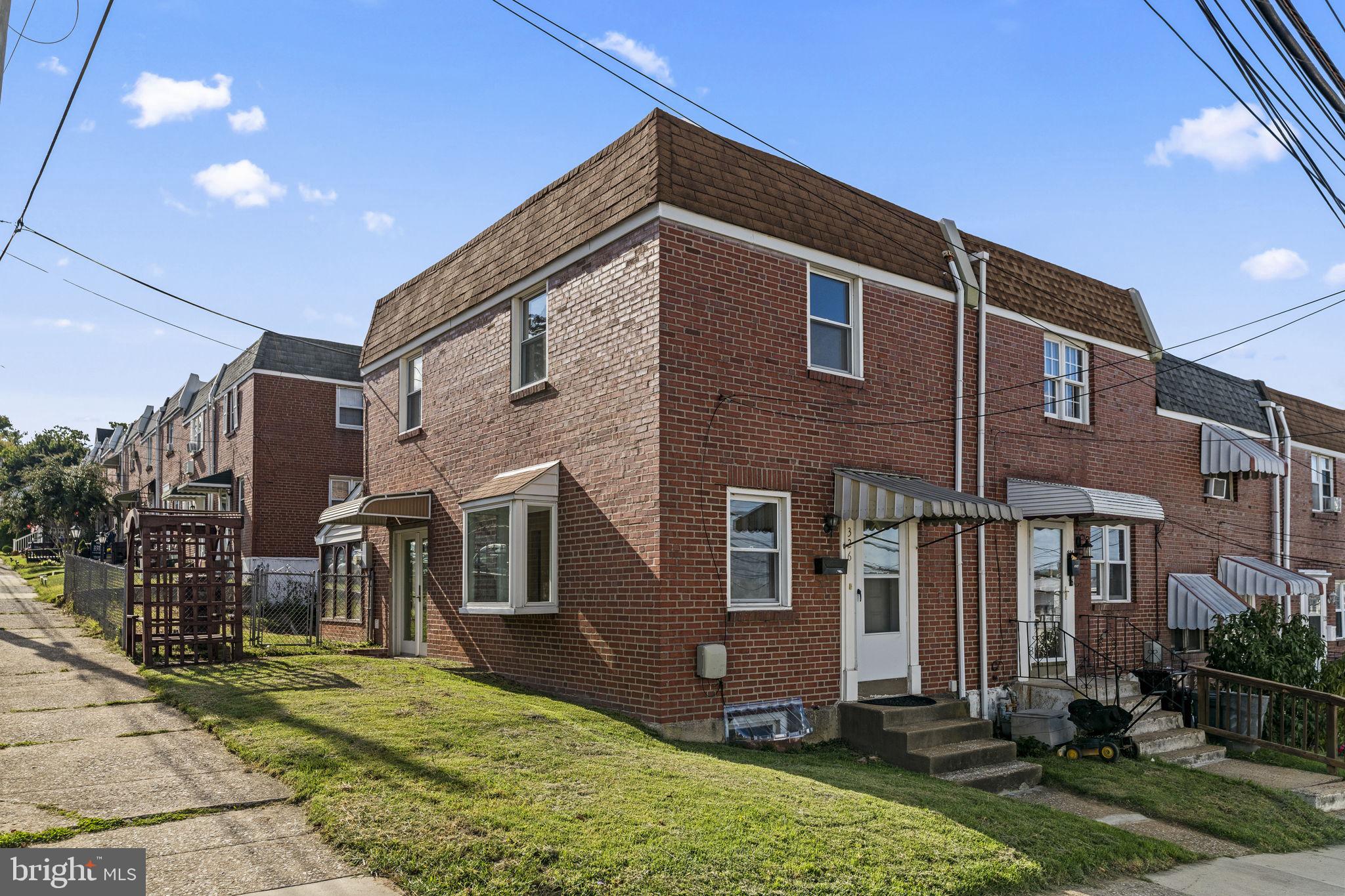 326 East Rambo Street Bridgeport, PA 19405 - Photo 2 of 23 a front view of a house with a yard