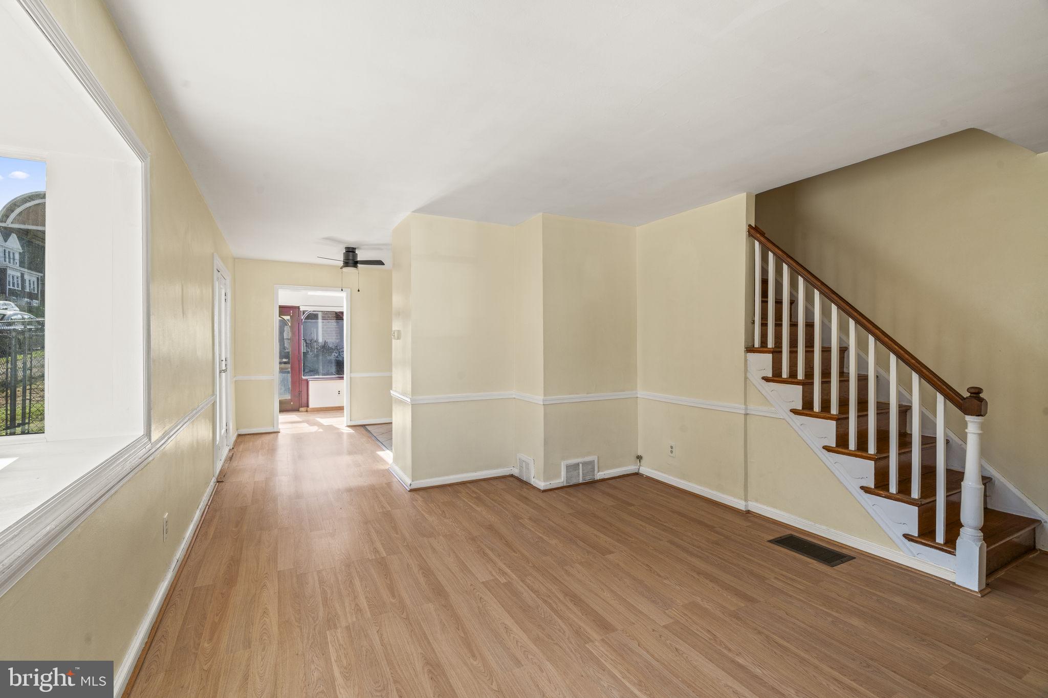 326 East Rambo Street Bridgeport, PA 19405 - Photo 4 of 23 a view of a hallway with wooden floor and staircase