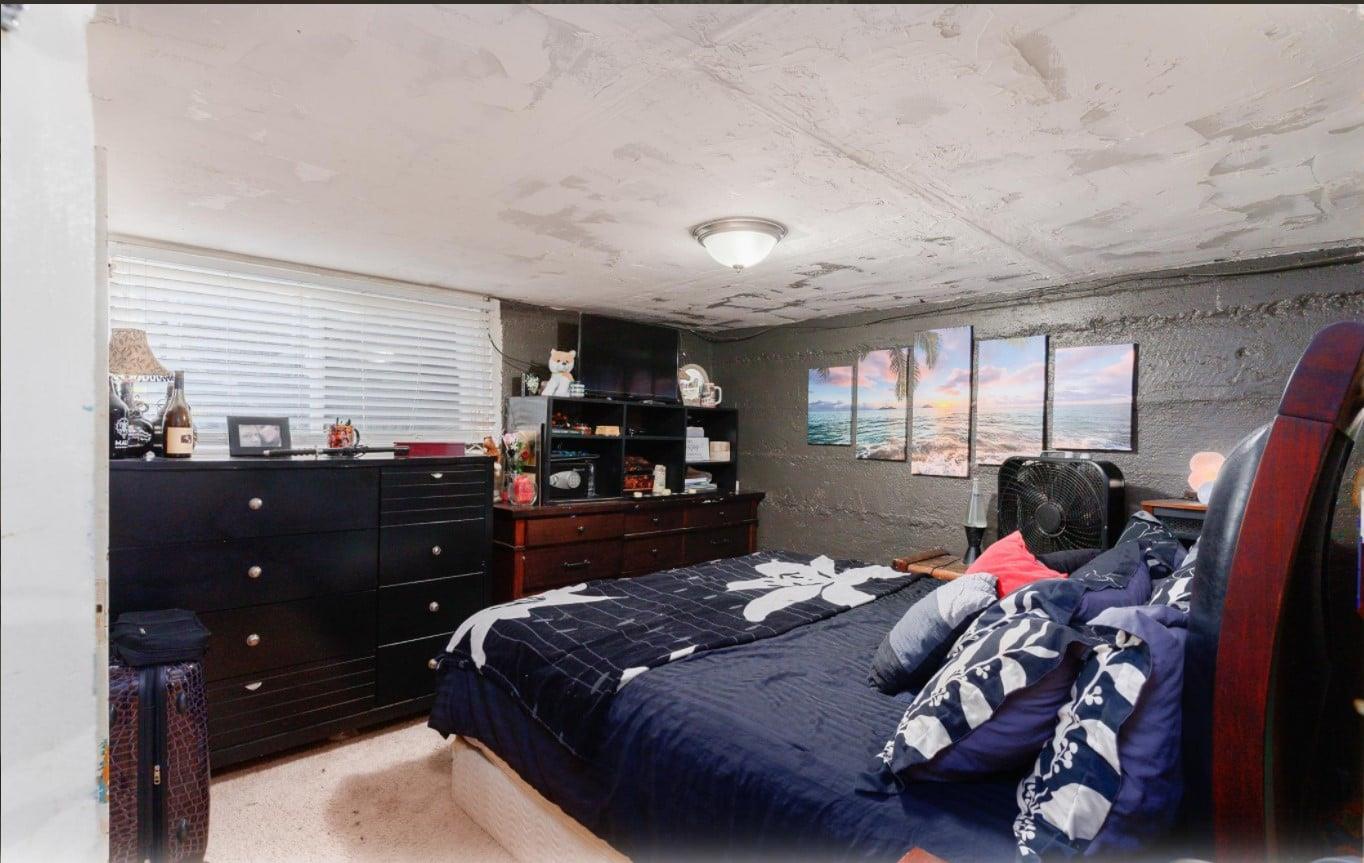 172 Rich Gulch Road Oroville, CA 95965 - Photo 14 of 37 a bed room with a bed and a television