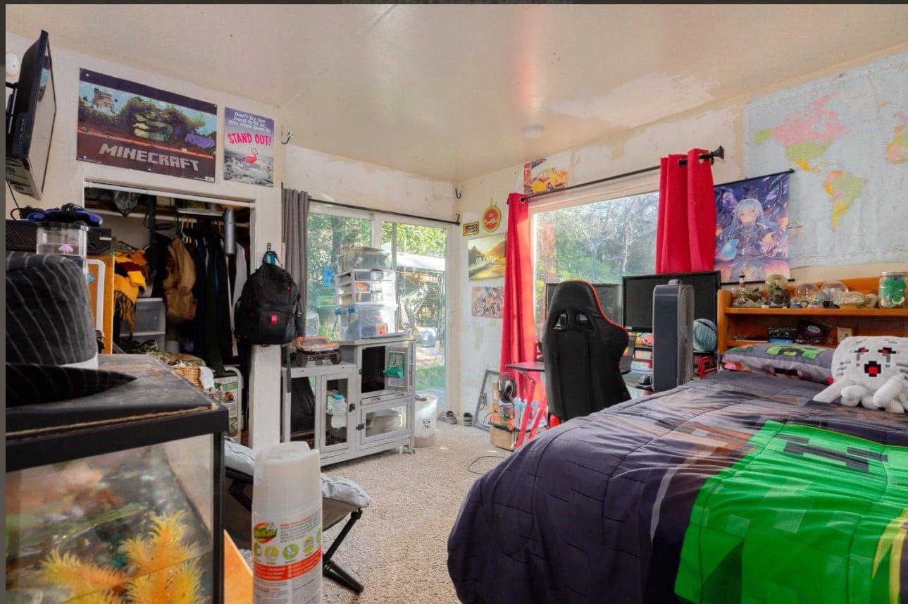 172 Rich Gulch Road Oroville, CA 95965 - Photo 8 of 37 a bed room with a bed and a window