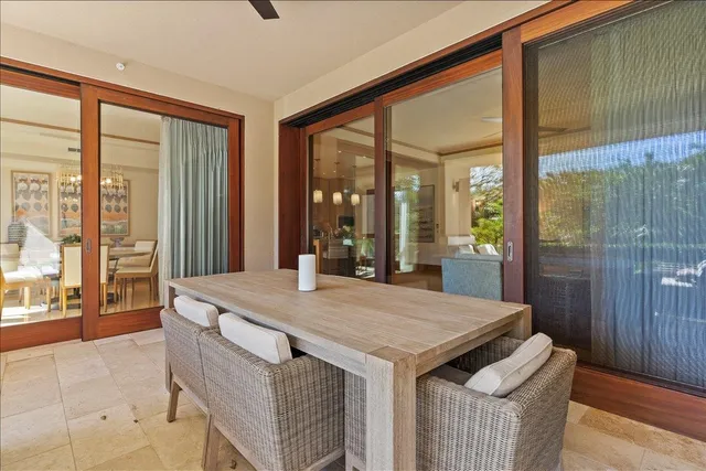 a room with a table and chairs