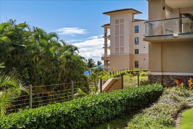 a view of a building with a garden