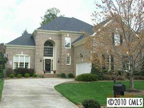 3421 Rhett Butler Place Charlotte, NC 28270 - Photo 1 of 8 a front view of a house with a garden