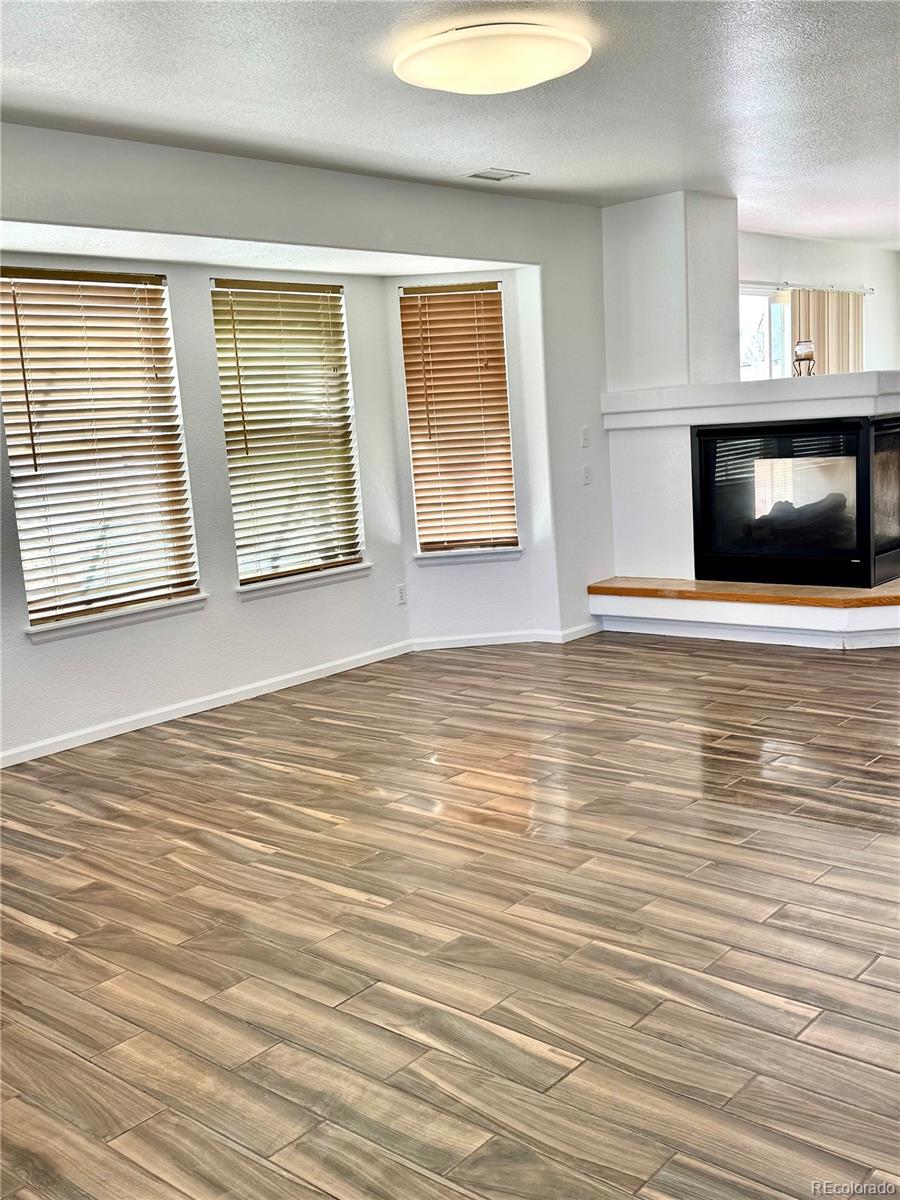 5553 Jebel Court Denver, CO 80249 - Photo 3 of 30