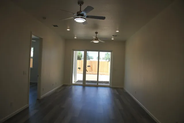 a view of balcony with furniture